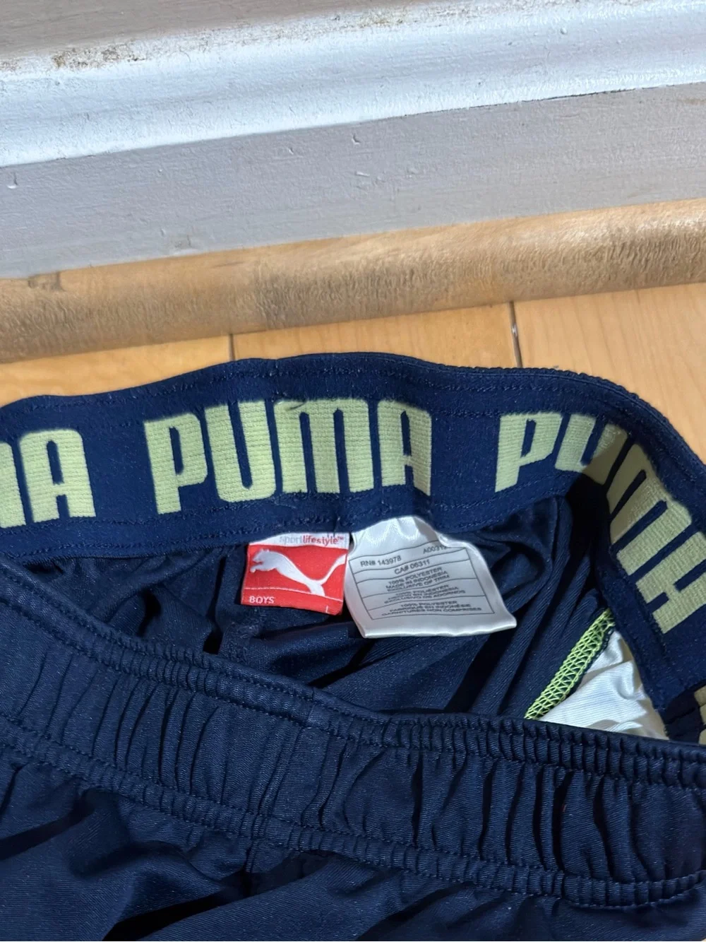 BOYS’ PUMA ATHLETIC SHORTS, NAVY/BRIGHT YELLOW, SIZE LARGE